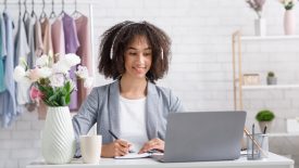A young professional working on a laptop