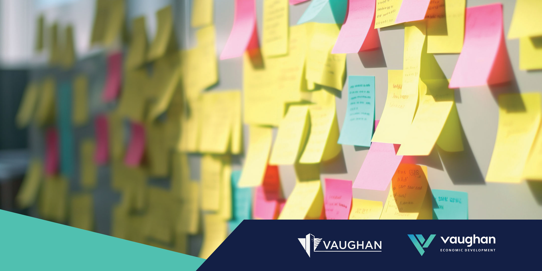 Scattered multi-coloured post-it notes on a whiteboard