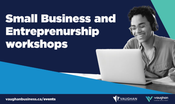 Person sitting on a desk with a laptop open