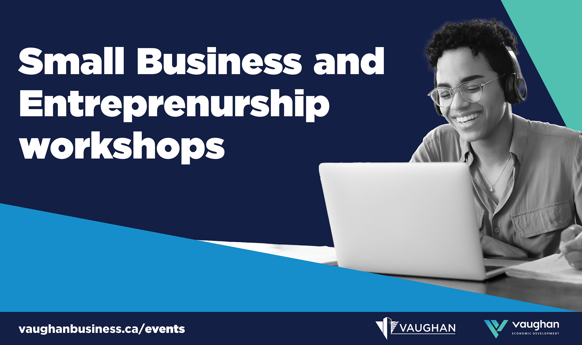 Person sitting on a desk with a laptop open